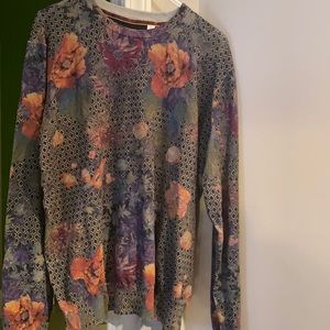 Worn once! This is a very light sweater good for many different occasions.